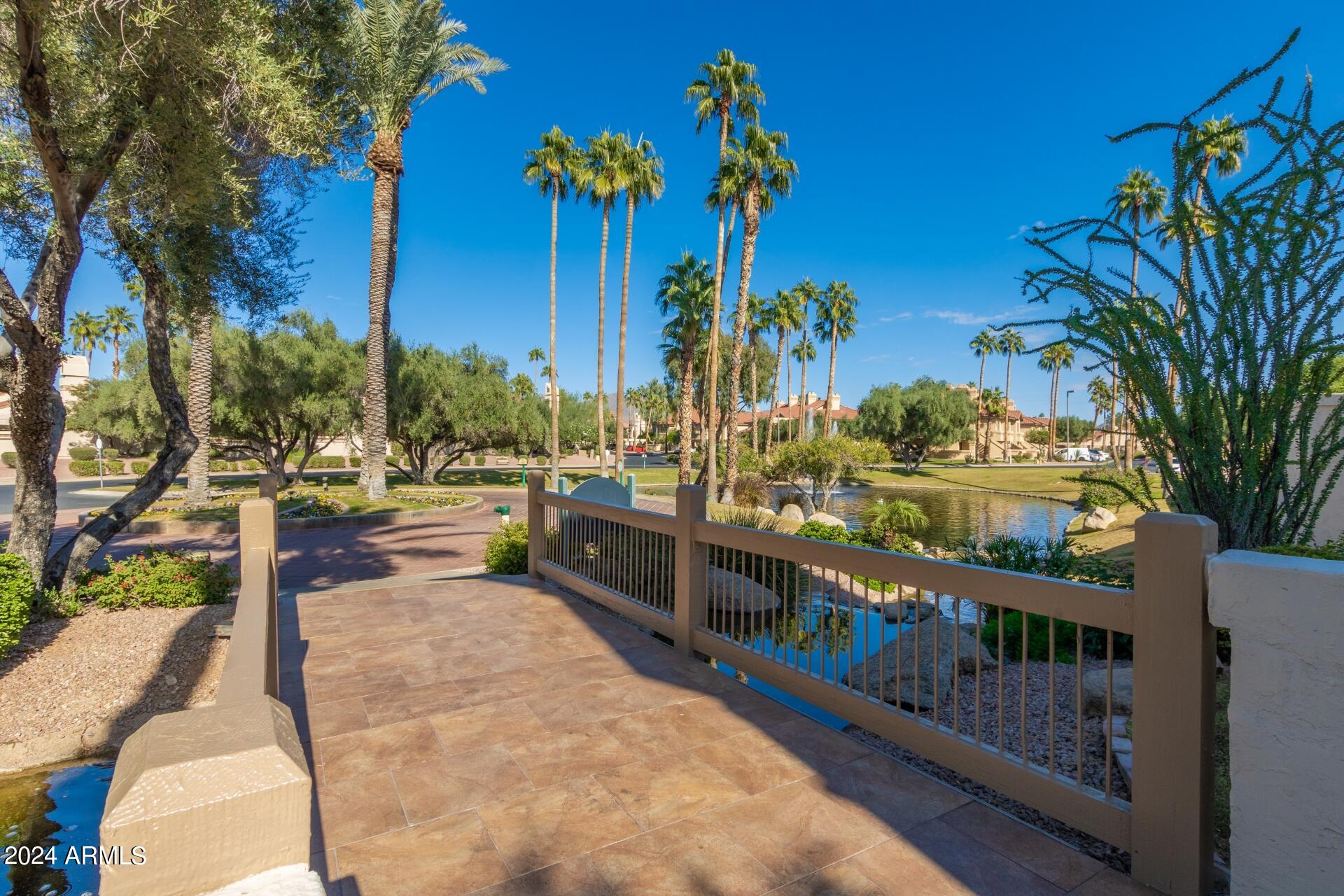 9705 East Mountain View Road, Unit 1036 Scottsdale, AZ 85258 - Photo 30 of 50 a view of a balcony with outdoor seating