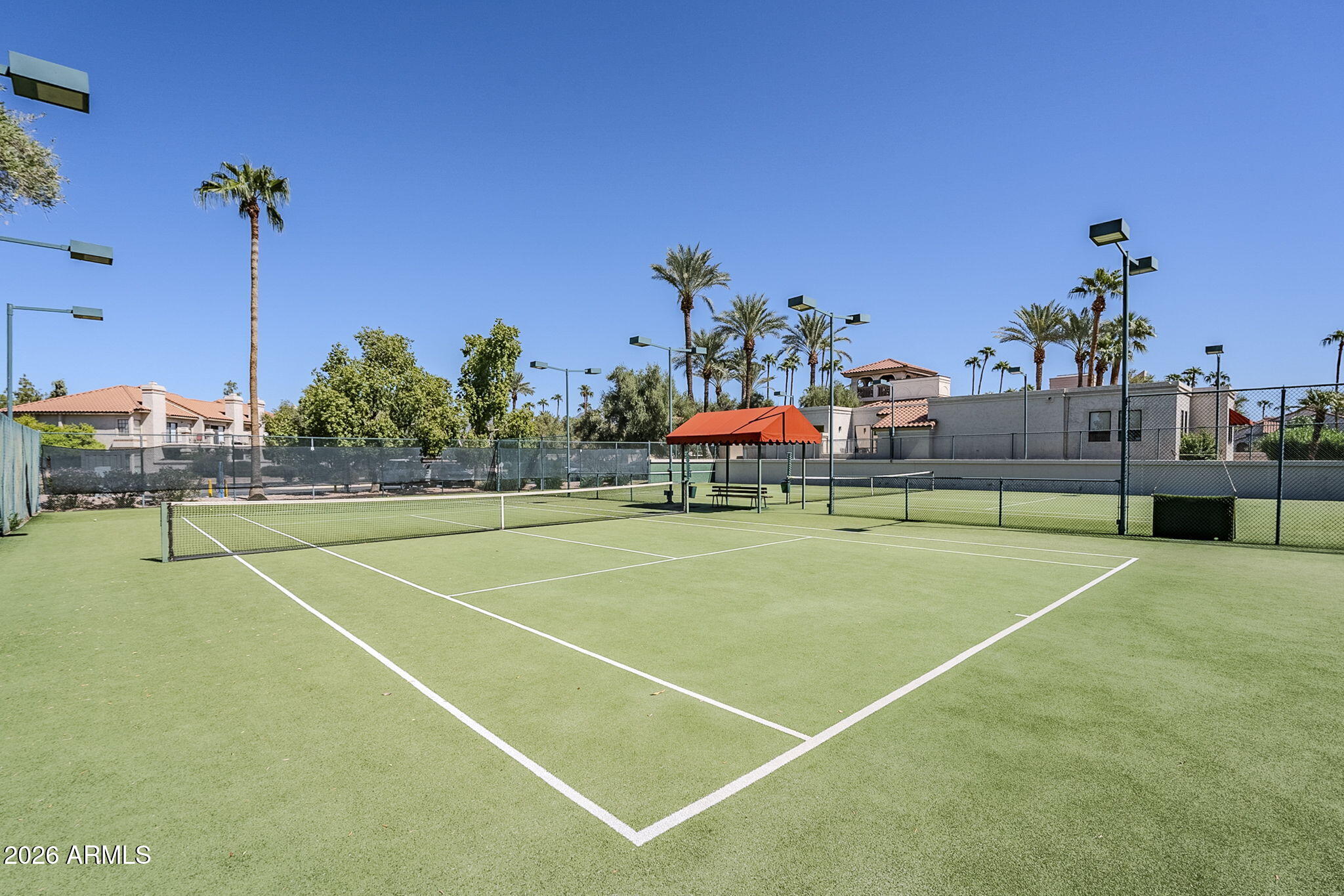 9705 East Mountain View Road, Unit 1036 Scottsdale, AZ 85258 - Photo 37 of 50 a view of a tennis court