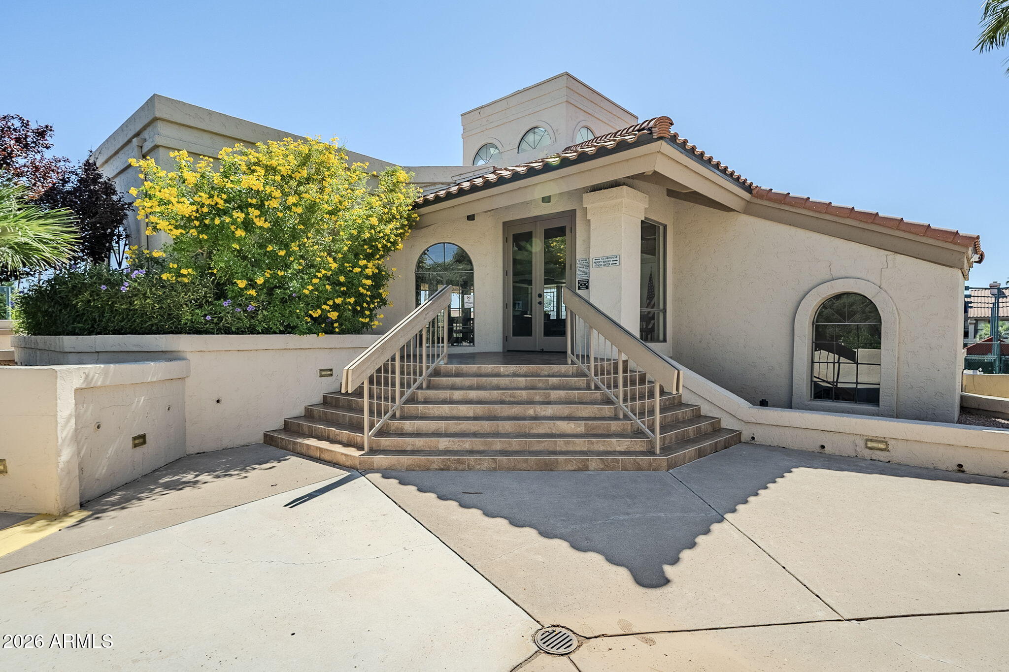 9705 East Mountain View Road, Unit 1036 Scottsdale, AZ 85258 - Photo 46 of 50 a view of a house with a large windows