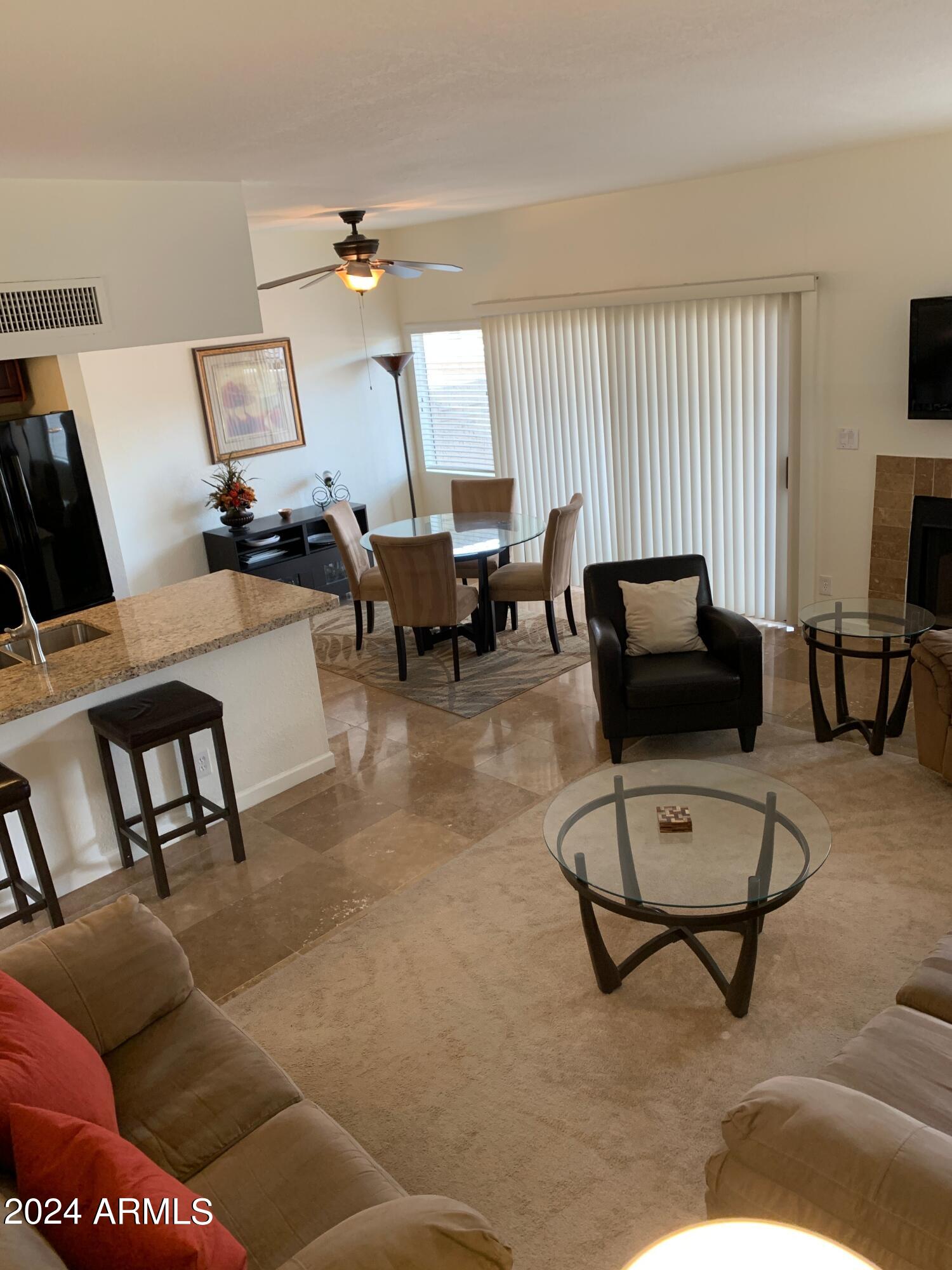 9705 East Mountain View Road, Unit 1036 Scottsdale, AZ 85258 - Photo 9 of 34 1036_livingroom area