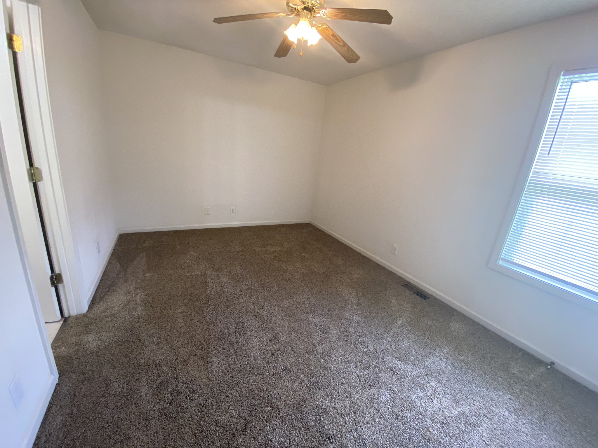 237 Tree Line Drive Oak Grove, KY 42262 - Photo 13 of 13 an empty room with a window