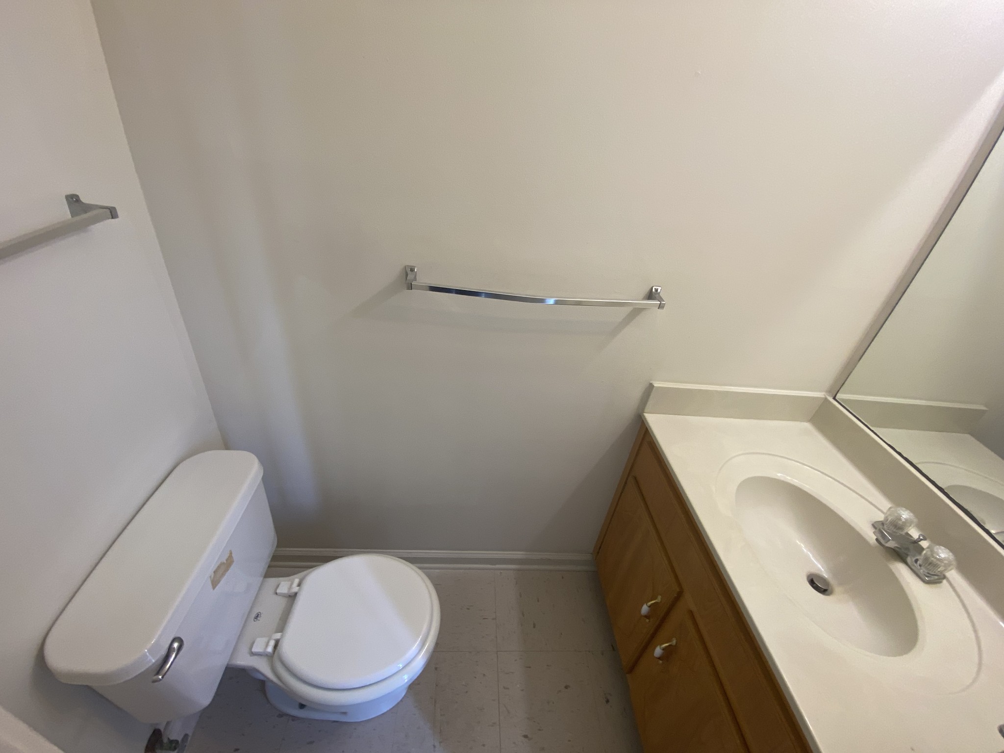 237 Tree Line Drive Oak Grove, KY 42262 - Photo 6 of 13 a white toilet sitting next to a sink and vanity