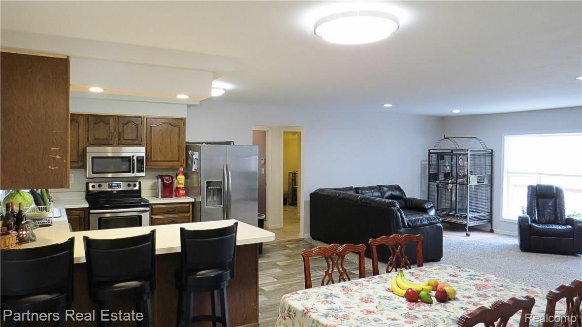 4850 Deal Road Fowlerville, MI 48836 - Photo 16 of 49 U-Shaped Kitchen Designed to Keep Cooks & Conversation Together. Perfect for Family & Friend Gatherings!