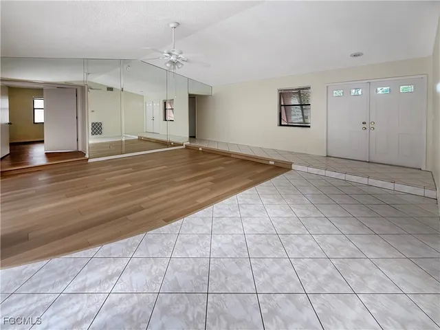 a view of an empty room and window