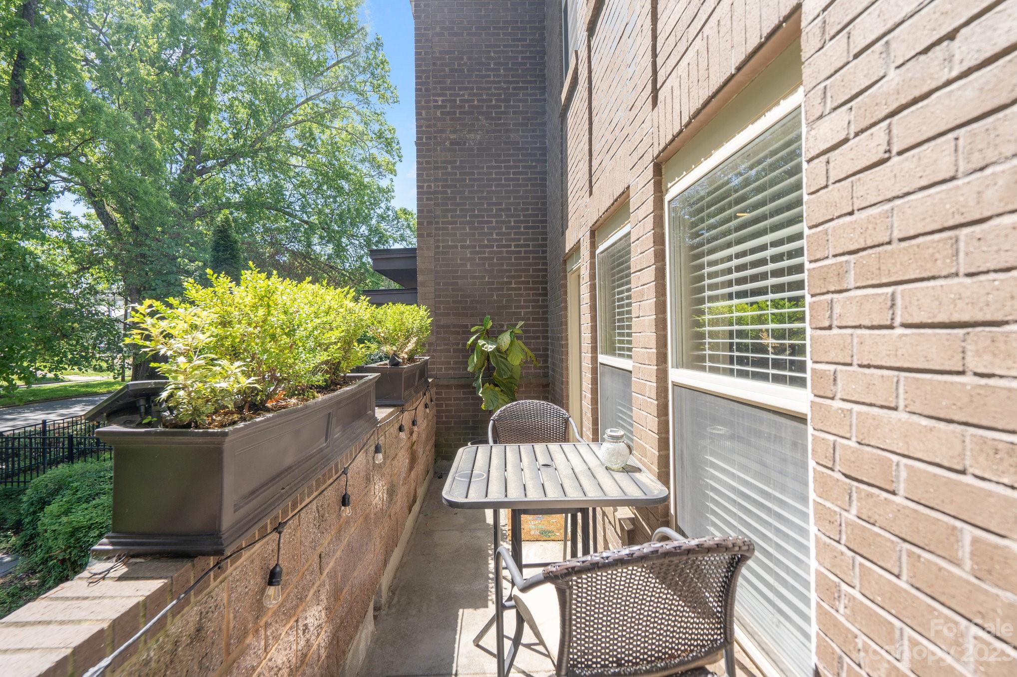 420 Queens Road, Unit 3 Charlotte, NC 28207 - Photo 11 of 35 a view of balcony with wooden floor