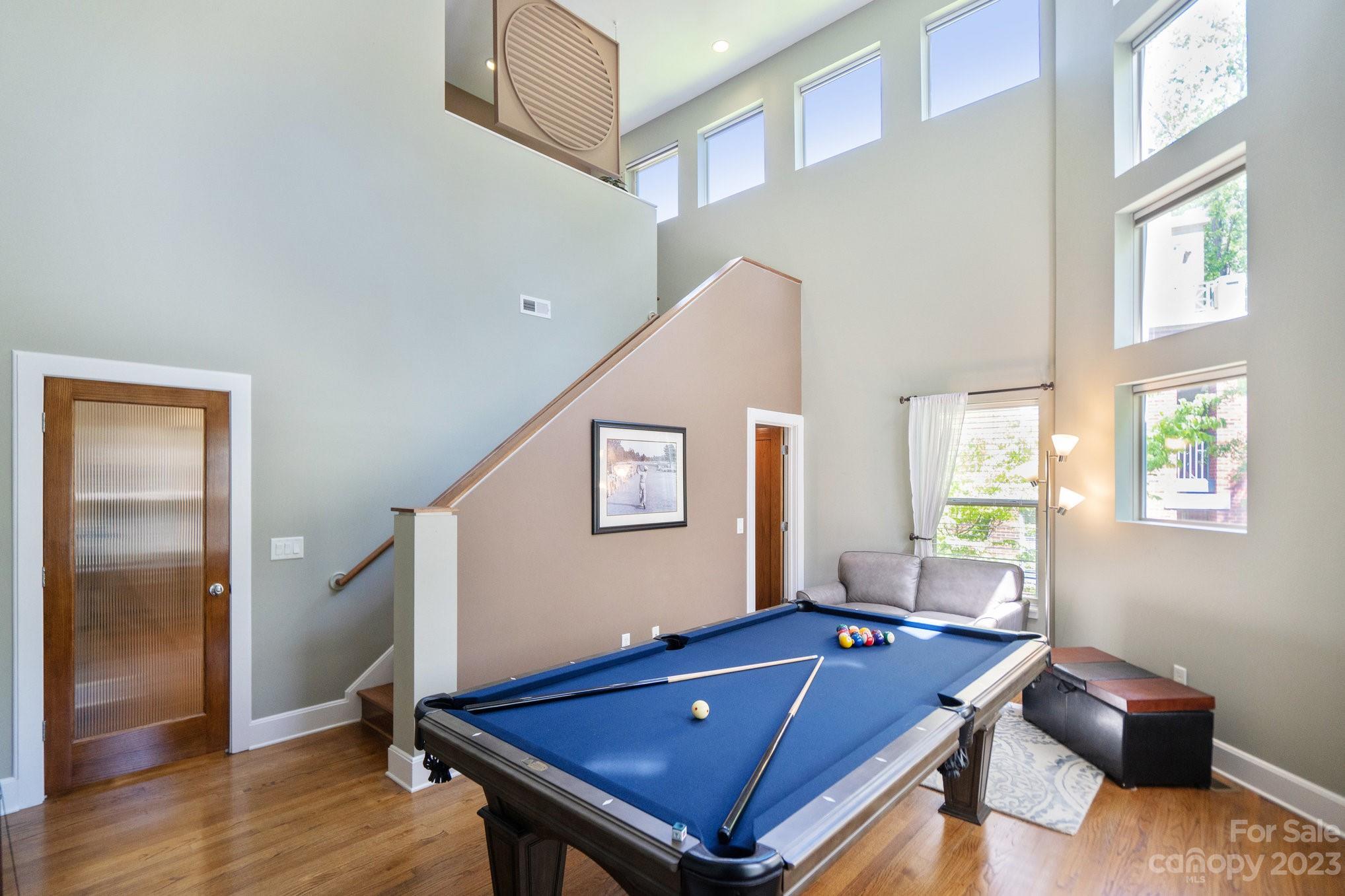 420 Queens Road, Unit 3 Charlotte, NC 28207 - Photo 15 of 35 a room with pool table and windows