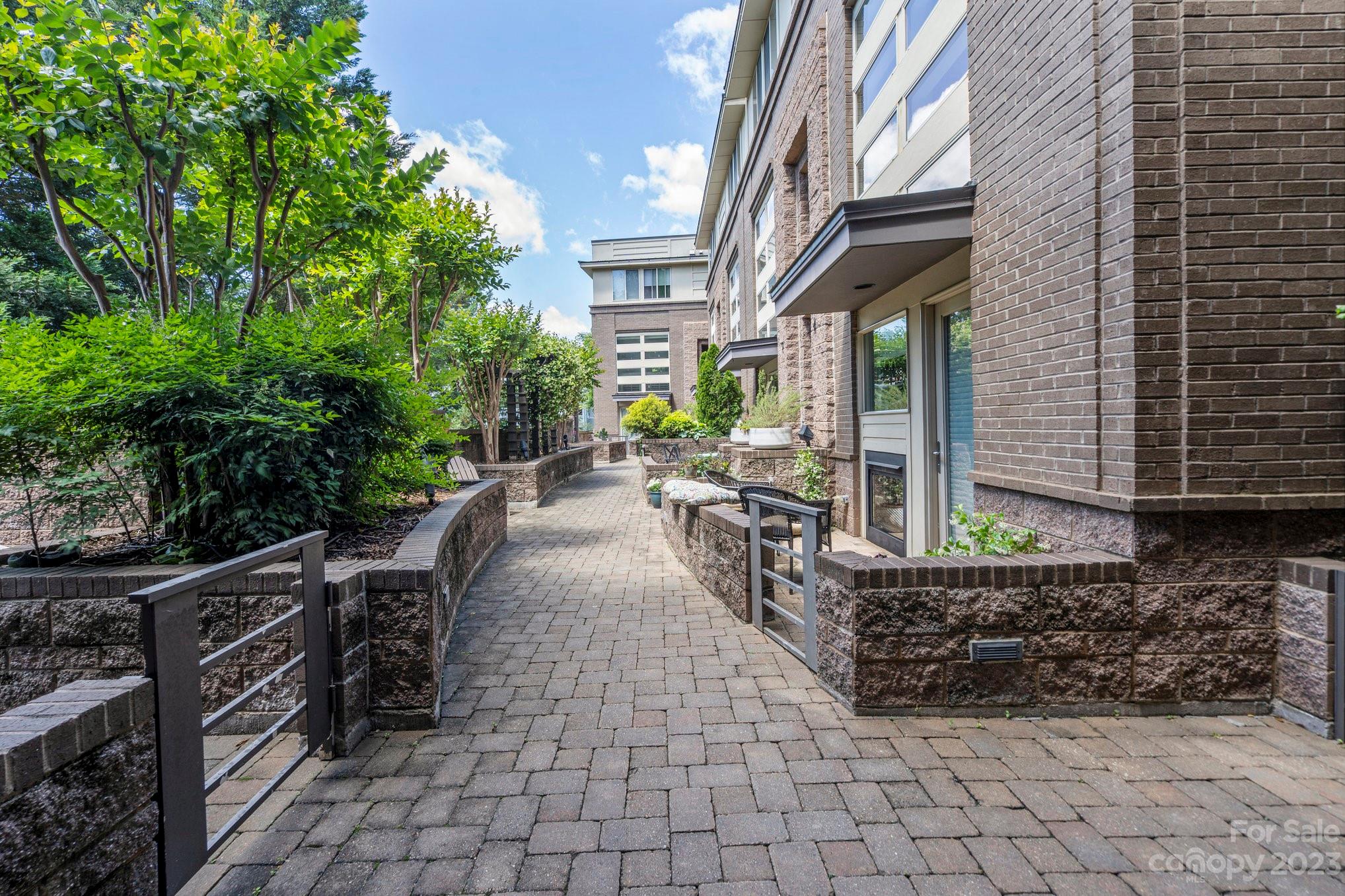 420 Queens Road, Unit 3 Charlotte, NC 28207 - Photo 2 of 35 a view of a chairs and tables in the patio