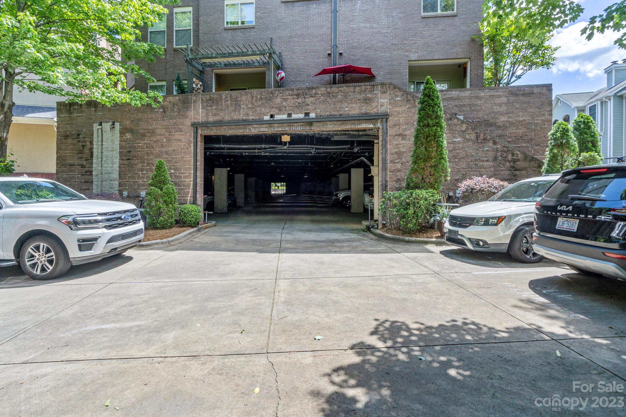 420 Queens Road, Unit 3 Charlotte, NC 28207 - Photo 31 of 35 a car parked in front of a house