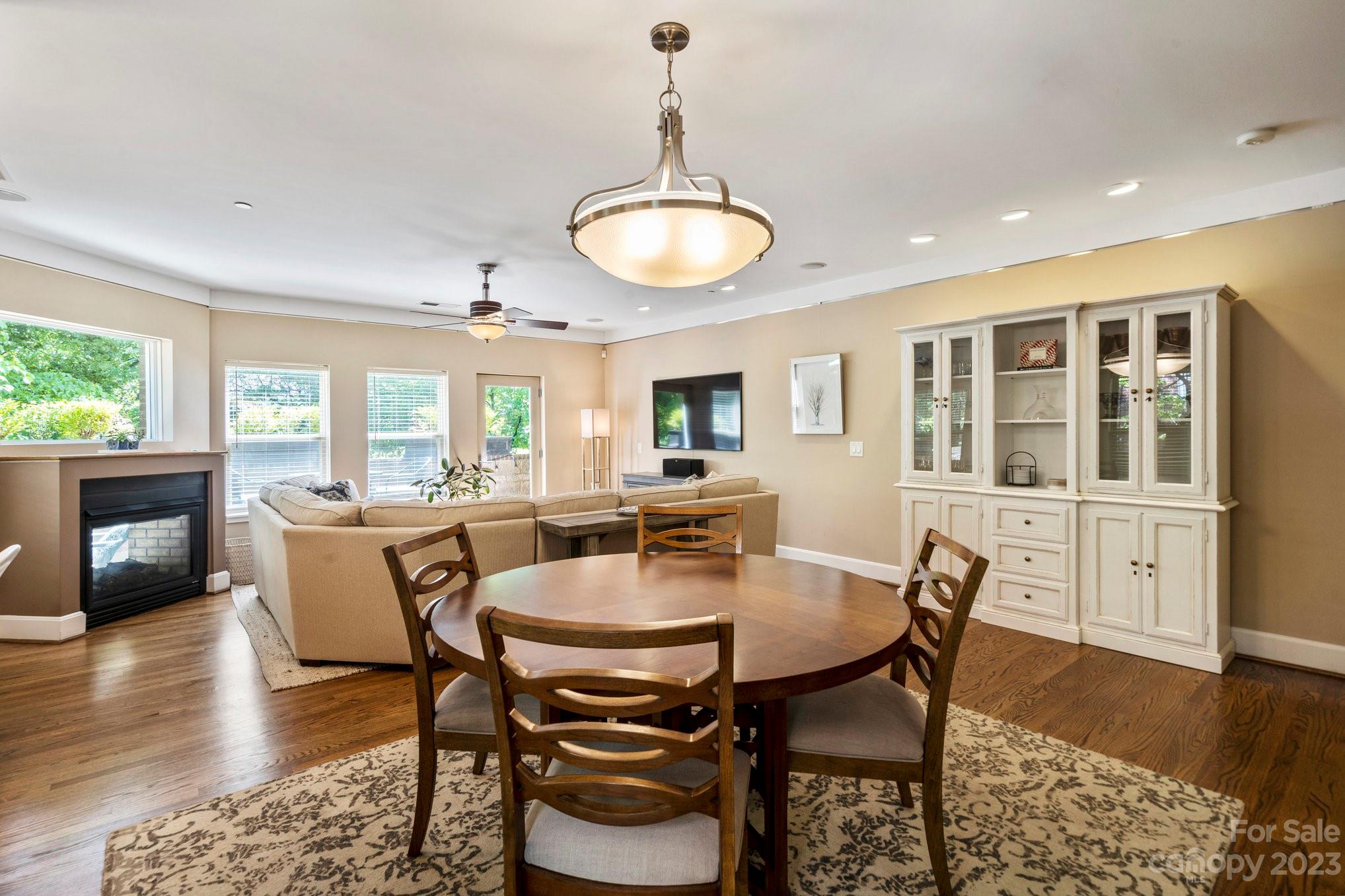 420 Queens Road, Unit 3 Charlotte, NC 28207 - Photo 4 of 35 a dining room with furniture window and wooden floor