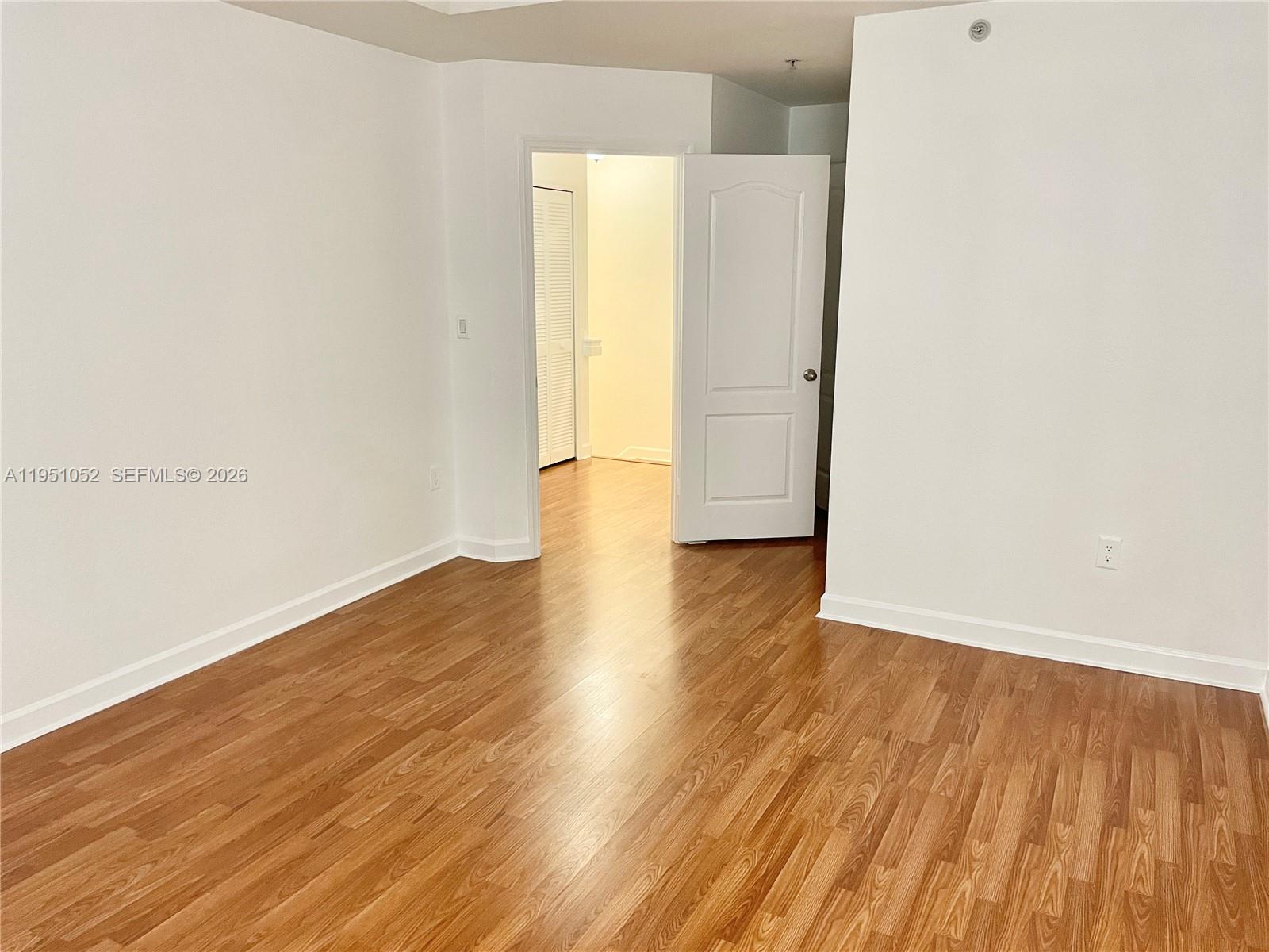 4321 Southwest 160th Avenue, Unit 202 Miramar, FL 33027 - Photo 18 of 18 a view of a room with wooden floor