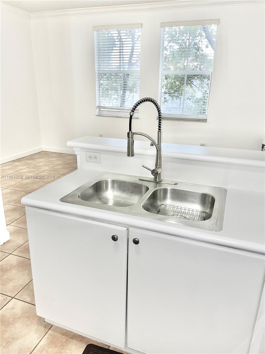 4321 Southwest 160th Avenue, Unit 202 Miramar, FL 33027 - Photo 5 of 18 a close view of sink and tap