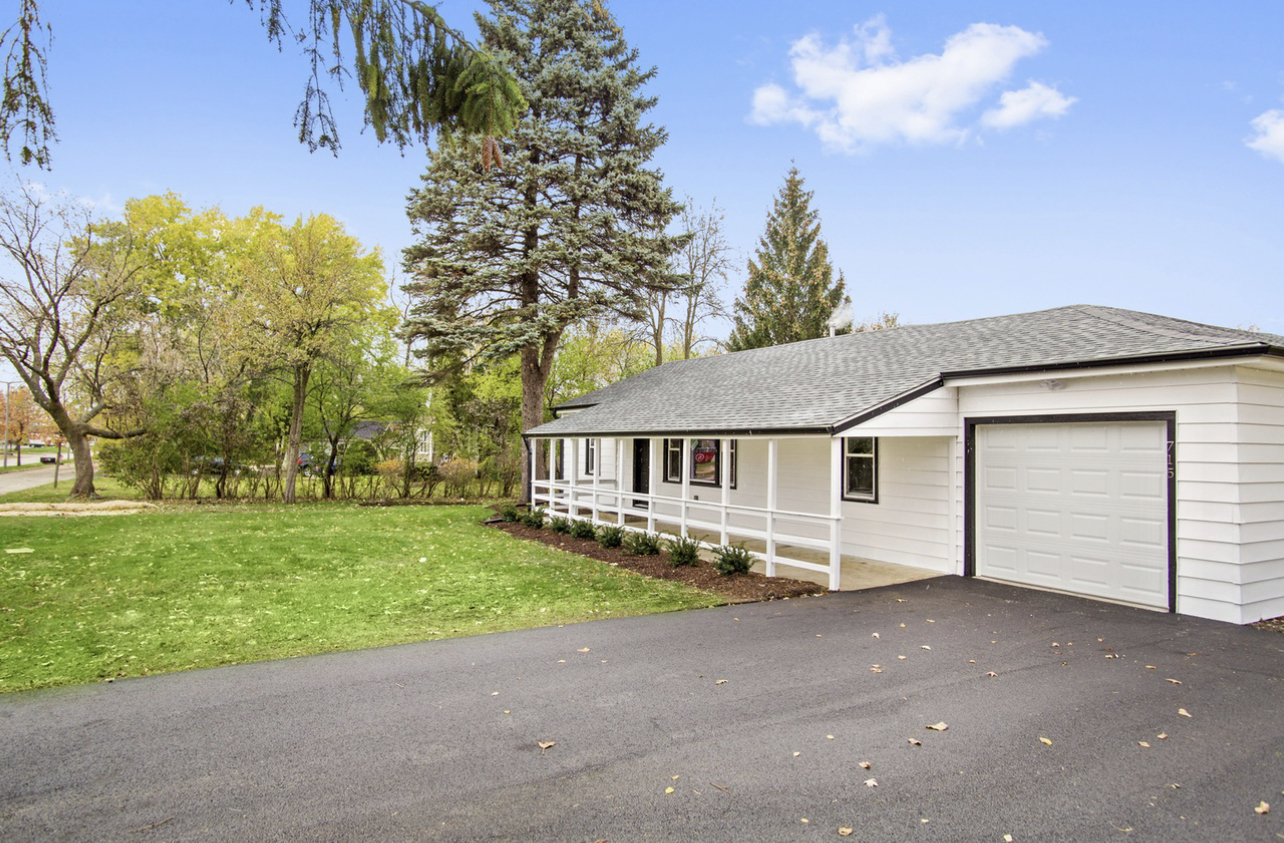 715 Anthony Trail Northbrook, IL 60062 - Photo 16 of 20 front view of a house with a yard