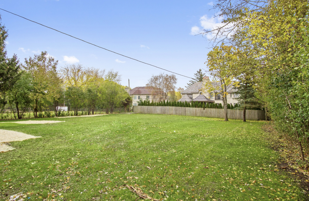 715 Anthony Trail Northbrook, IL 60062 - Photo 19 of 20 a view of a field of grass and trees