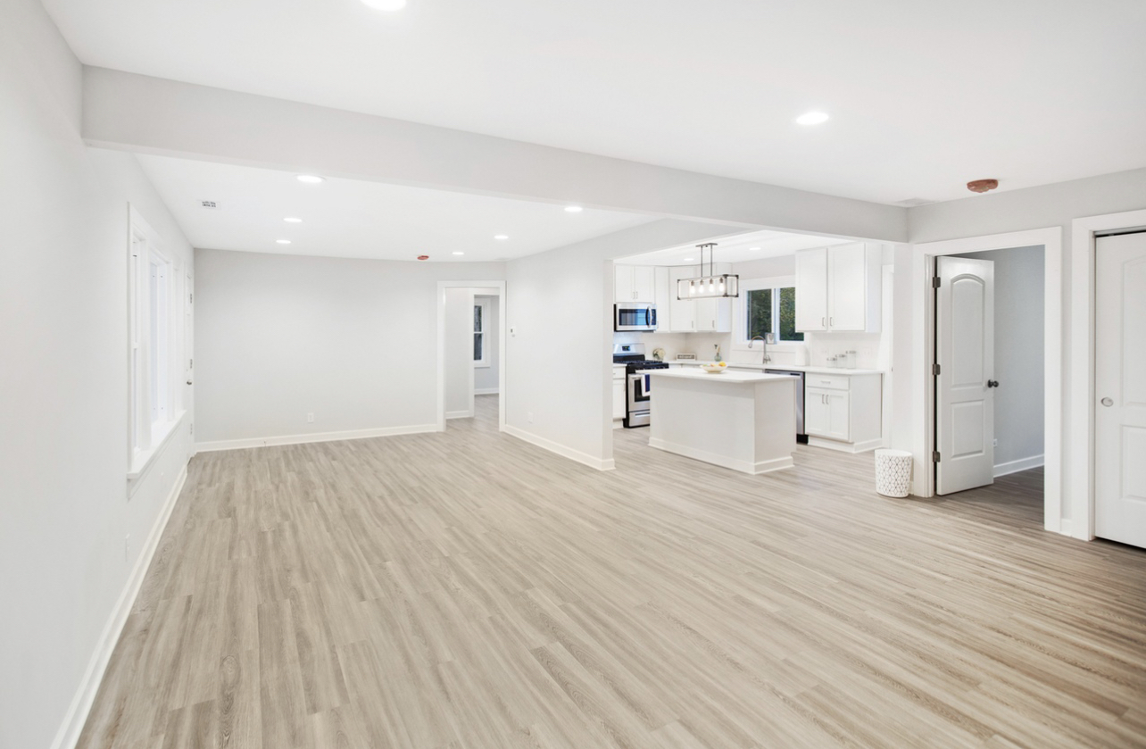 715 Anthony Trail Northbrook, IL 60062 - Photo 5 of 20 a view of kitchen with wooden floor and window