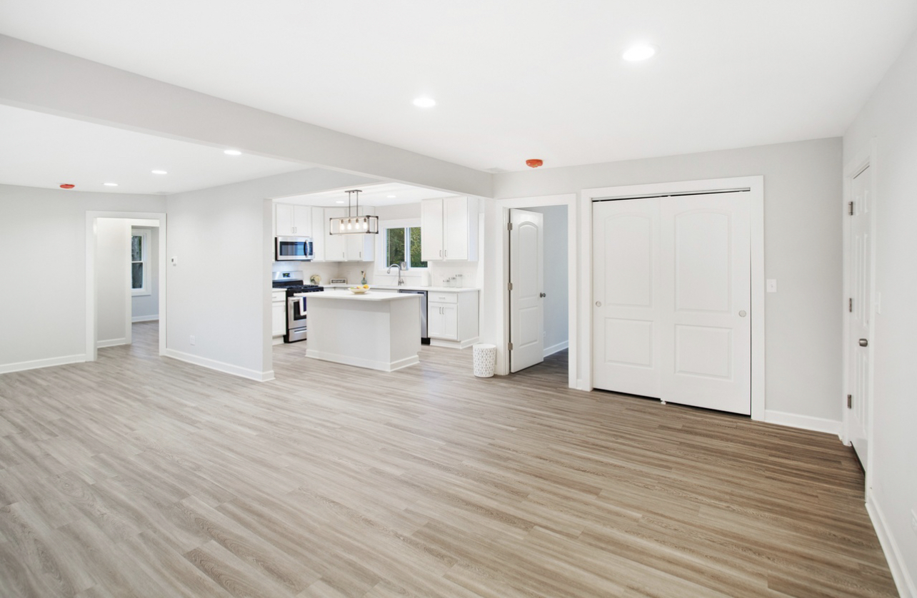 715 Anthony Trail Northbrook, IL 60062 - Photo 6 of 20 a view of kitchen with wooden floor and window