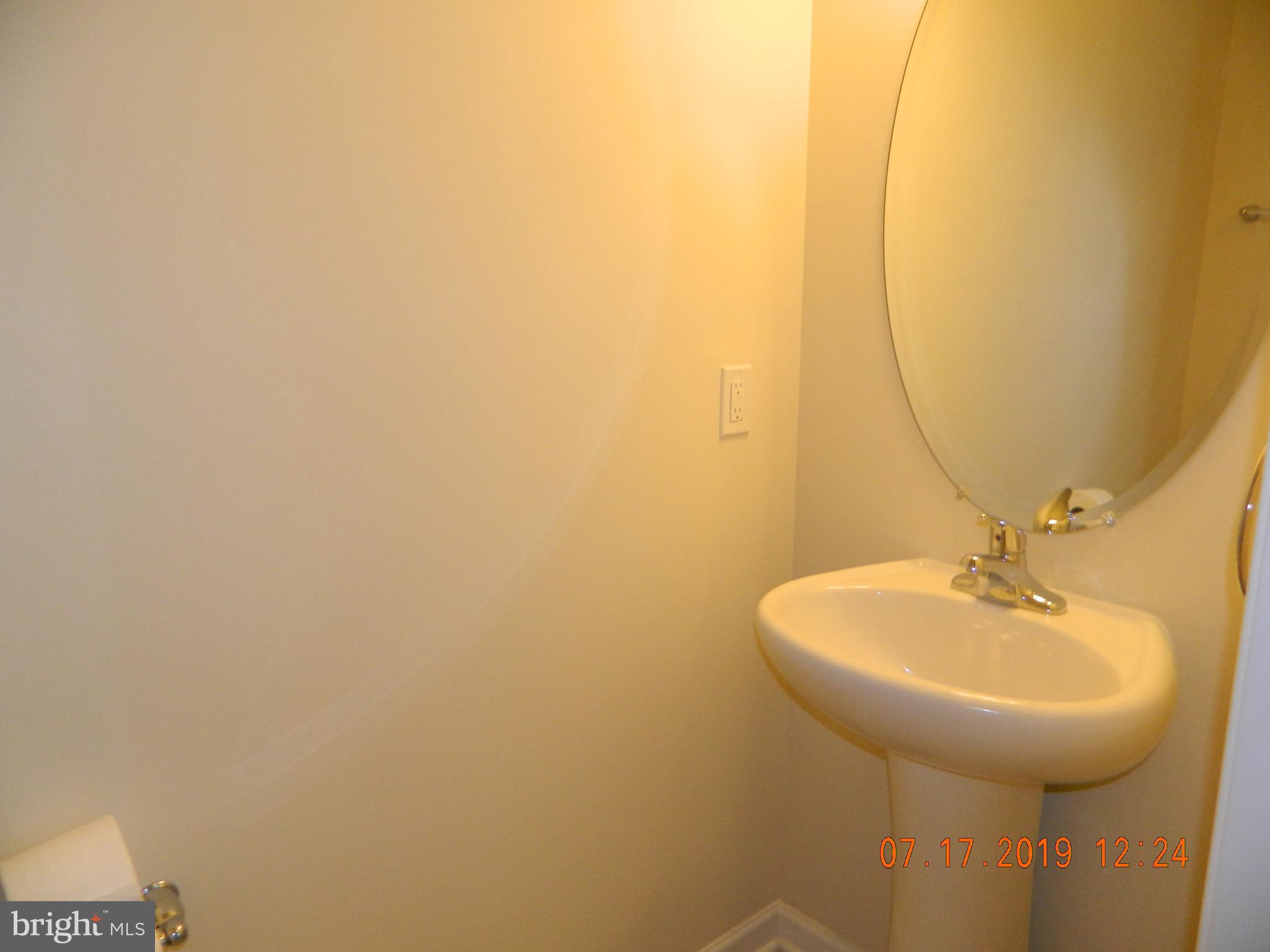 24 Baltic Lane Ranson, WV 25438 - Photo 12 of 35 Powder room