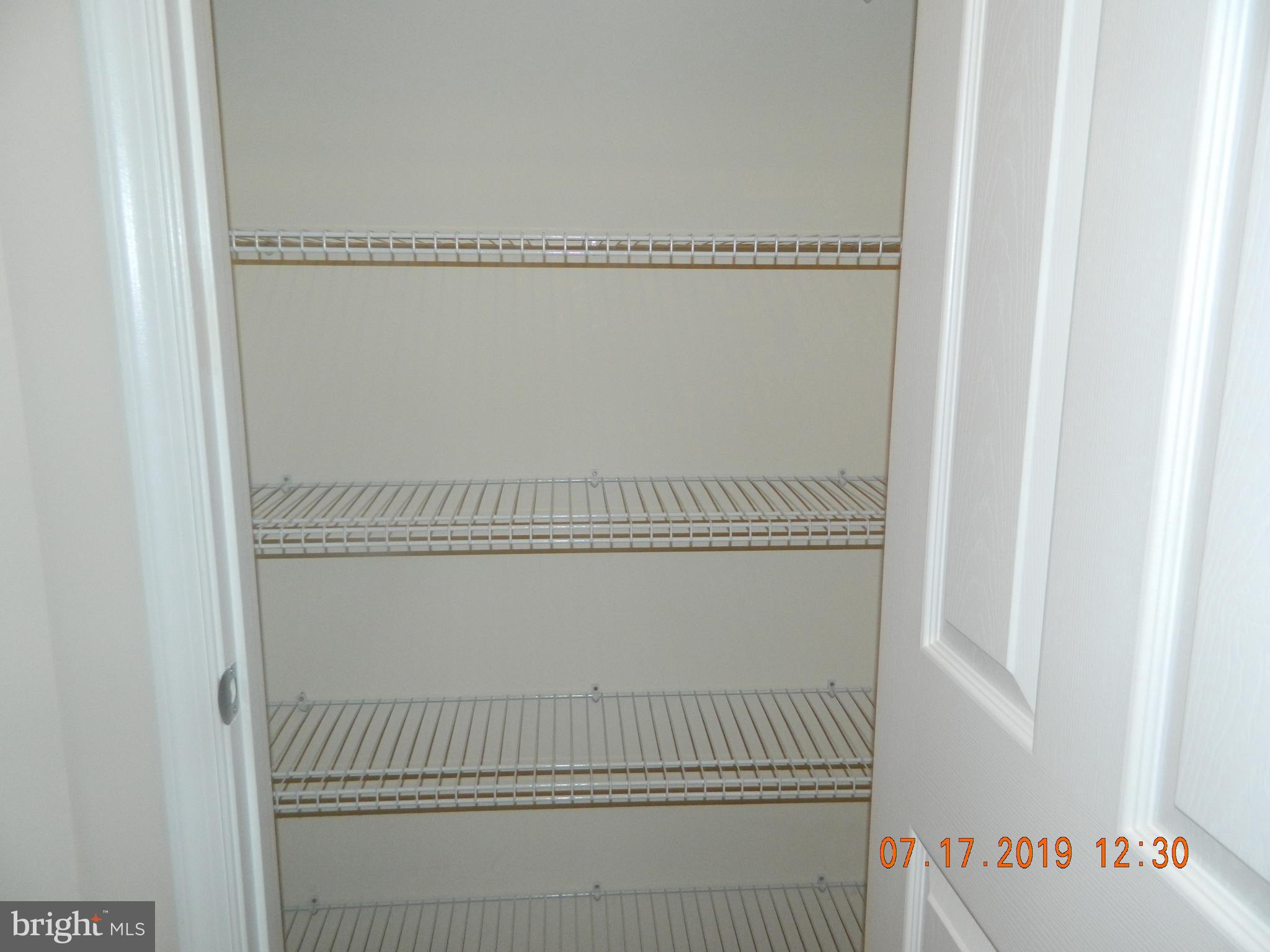 24 Baltic Lane Ranson, WV 25438 - Photo 20 of 35 Upstairs linen closet