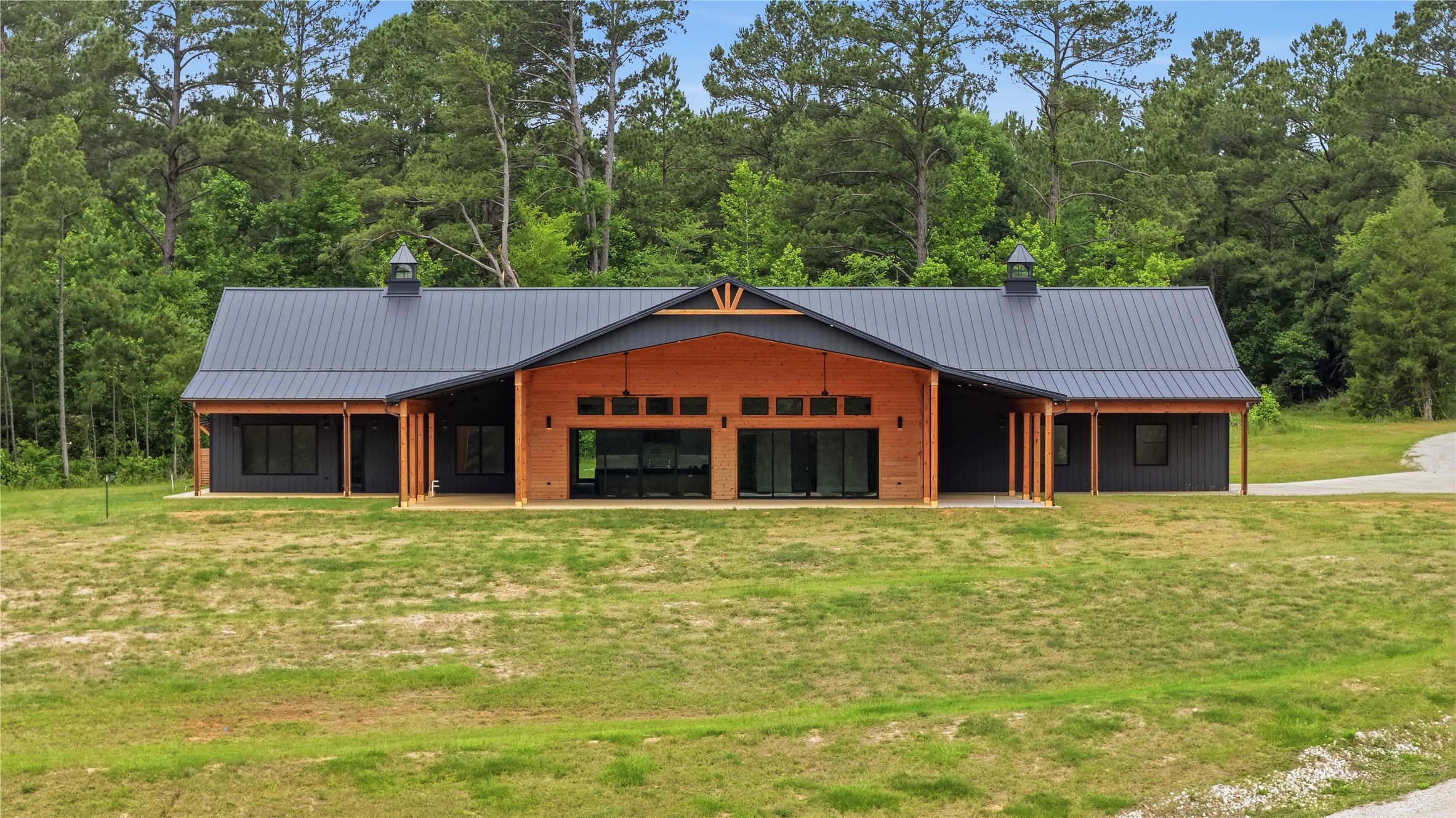 447 County Road 2211 Rusk, TX 75785 - Photo 16 of 50 a front view of a house with a yard
