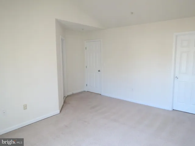 an empty room with an entryway