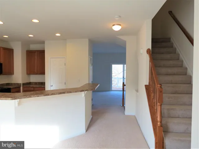 a view of a kitchen with a sink