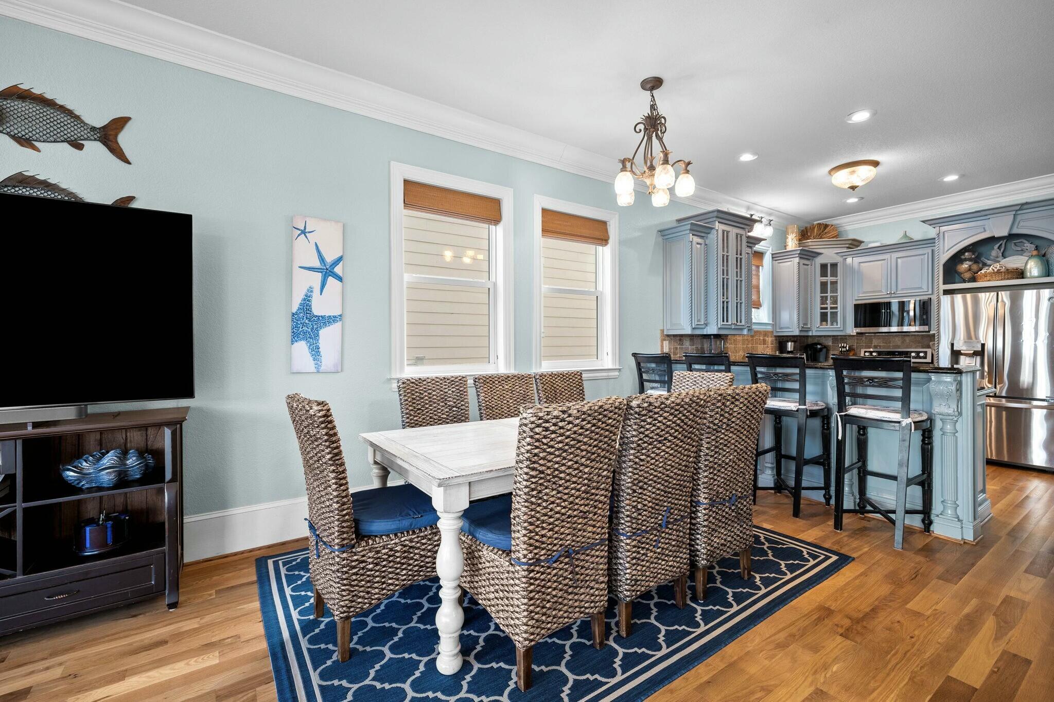 136 Surfer Lane Inlet Beach, FL 32461 - Photo 17 of 50 a dining room with furniture a chandelier and wooden floor