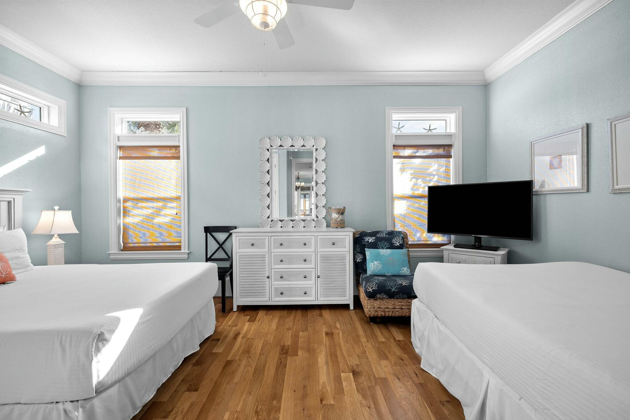 136 Surfer Lane Inlet Beach, FL 32461 - Photo 26 of 50 a bedroom with a bed and a flat screen tv