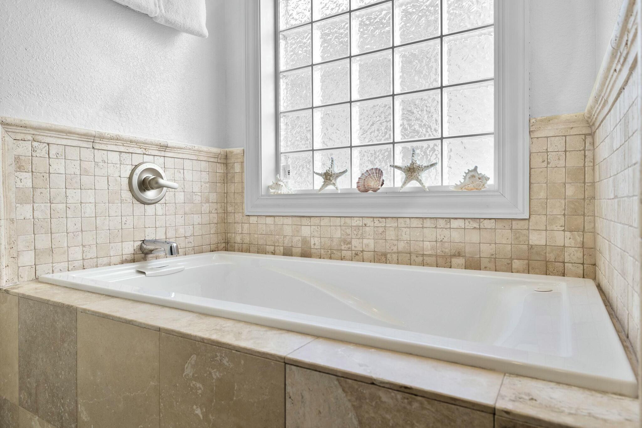 136 Surfer Lane Inlet Beach, FL 32461 - Photo 30 of 50 a bathroom with a bathtub and a sink