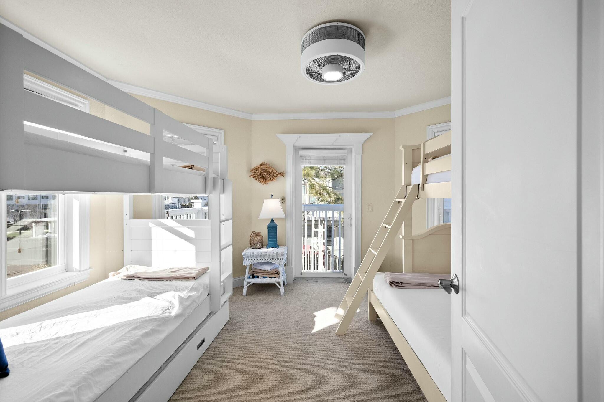 136 Surfer Lane Inlet Beach, FL 32461 - Photo 34 of 50 a spacious bedroom with a bed and a large window