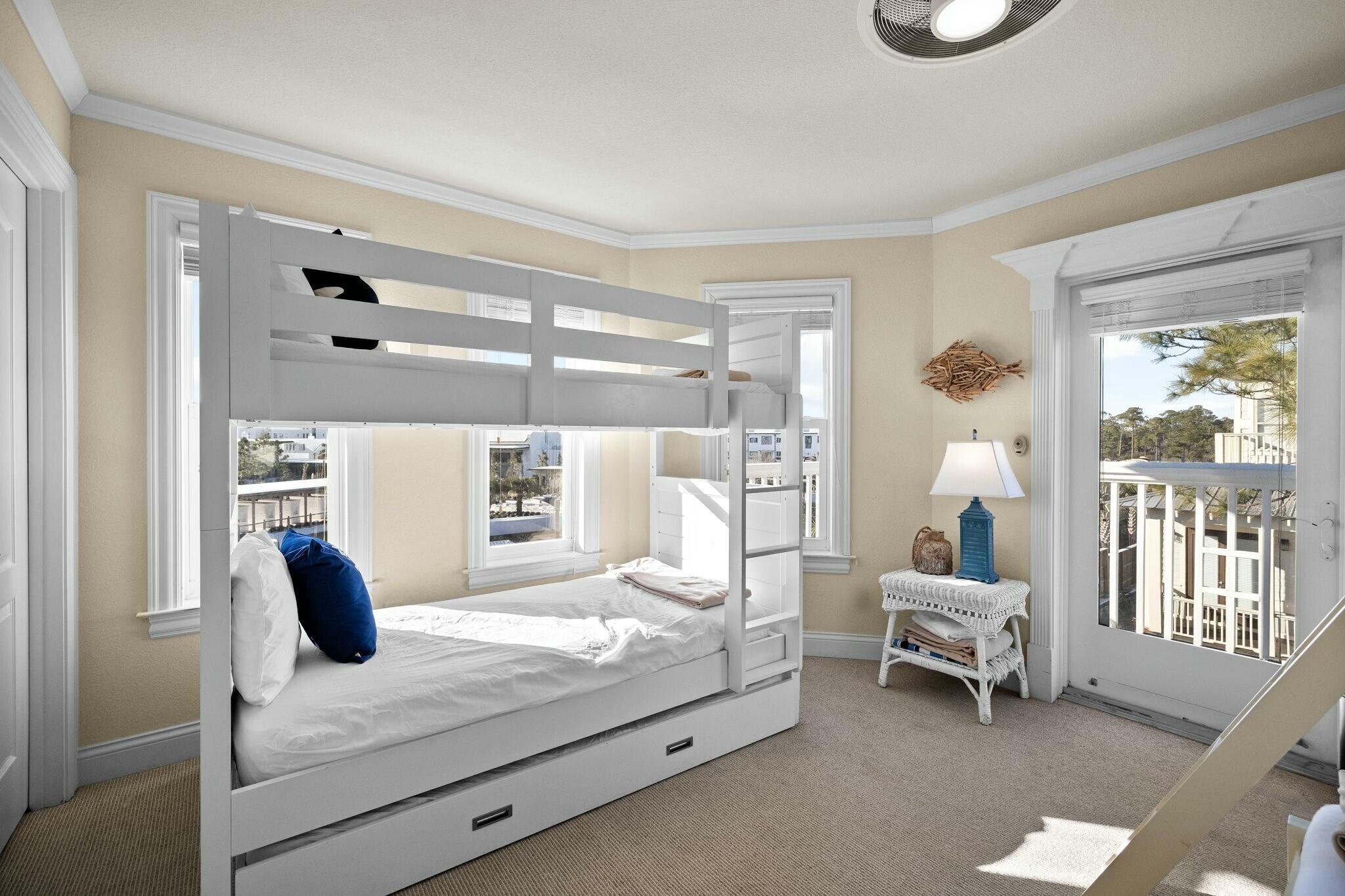 136 Surfer Lane Inlet Beach, FL 32461 - Photo 35 of 50 a bedroom with a bed and large window with outer view