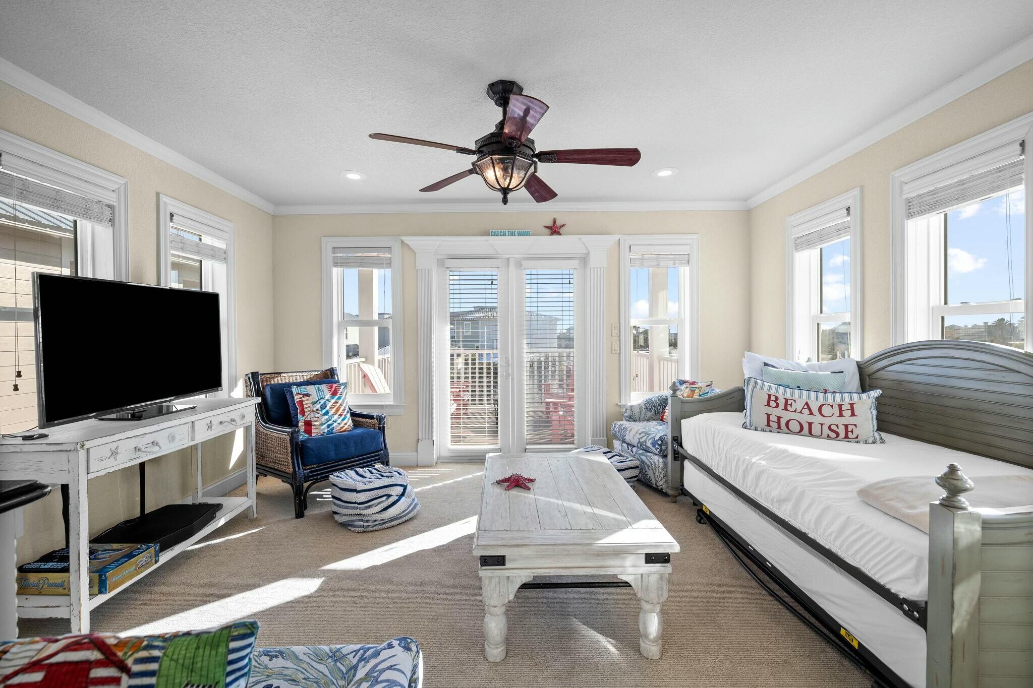 136 Surfer Lane Inlet Beach, FL 32461 - Photo 36 of 50 a living room with furniture and a flat screen tv