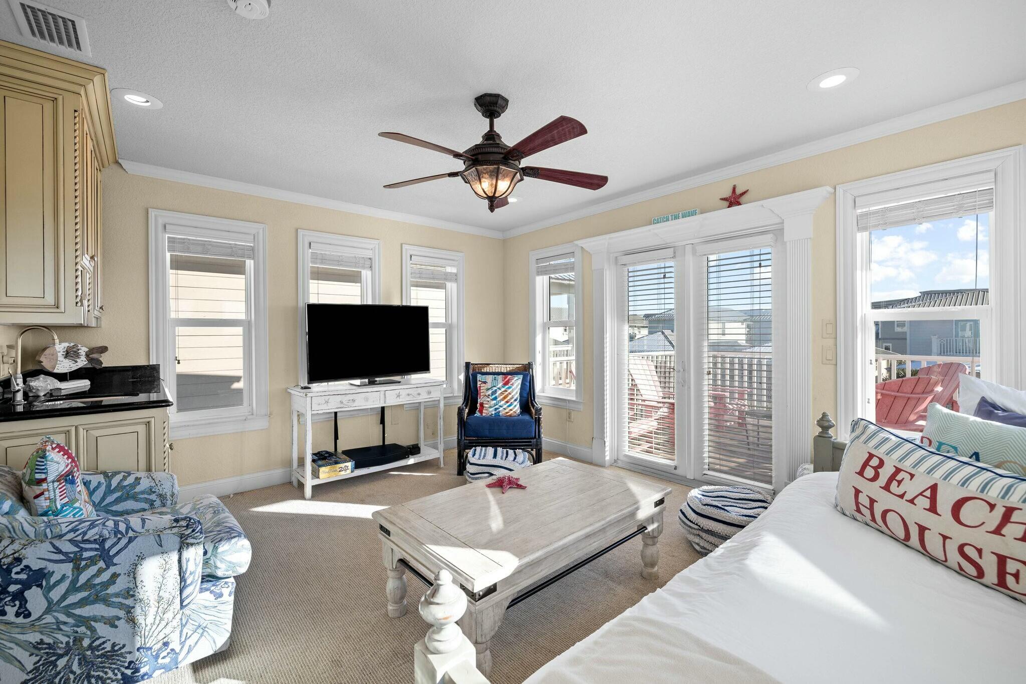 136 Surfer Lane Inlet Beach, FL 32461 - Photo 38 of 50 a living room with furniture and a flat screen tv