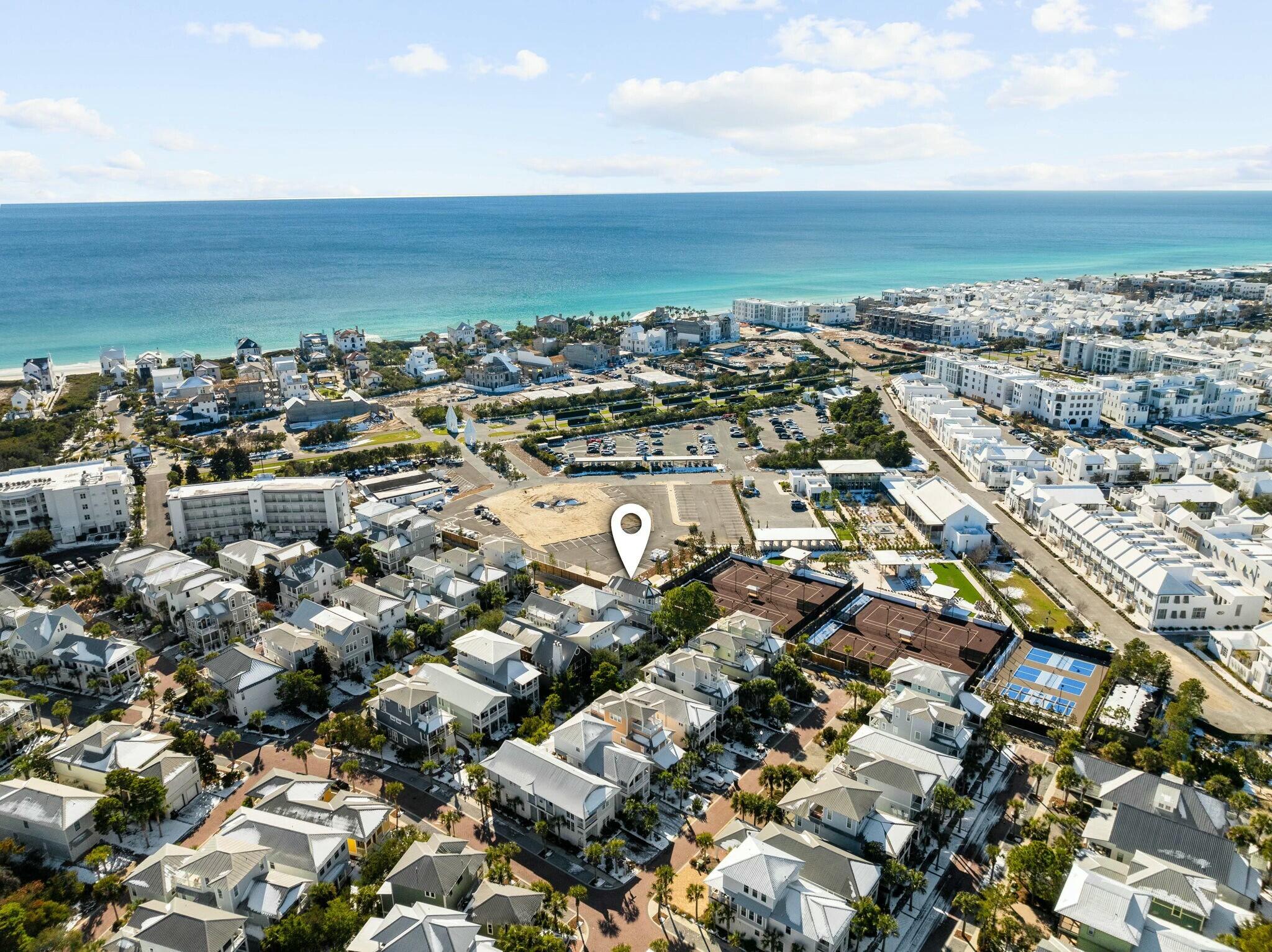 136 Surfer Lane Inlet Beach, FL 32461 - Photo 50 of 50 an aerial view of a city with lots of residential buildings and ocean view in back