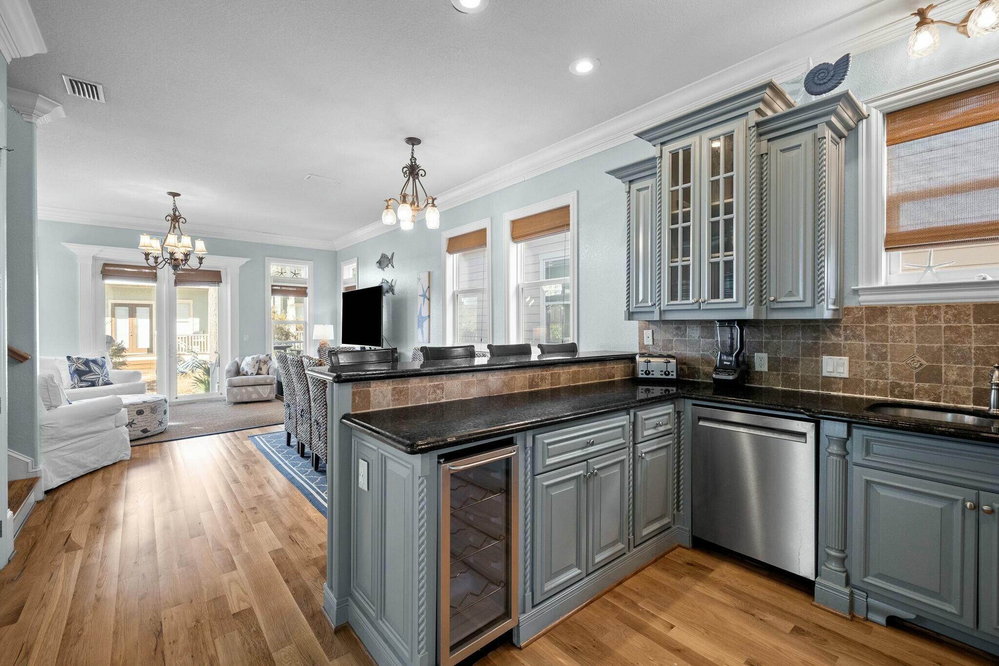 136 Surfer Lane Inlet Beach, FL 32461 - Photo 5 of 50 a kitchen with a sink stove and cabinets