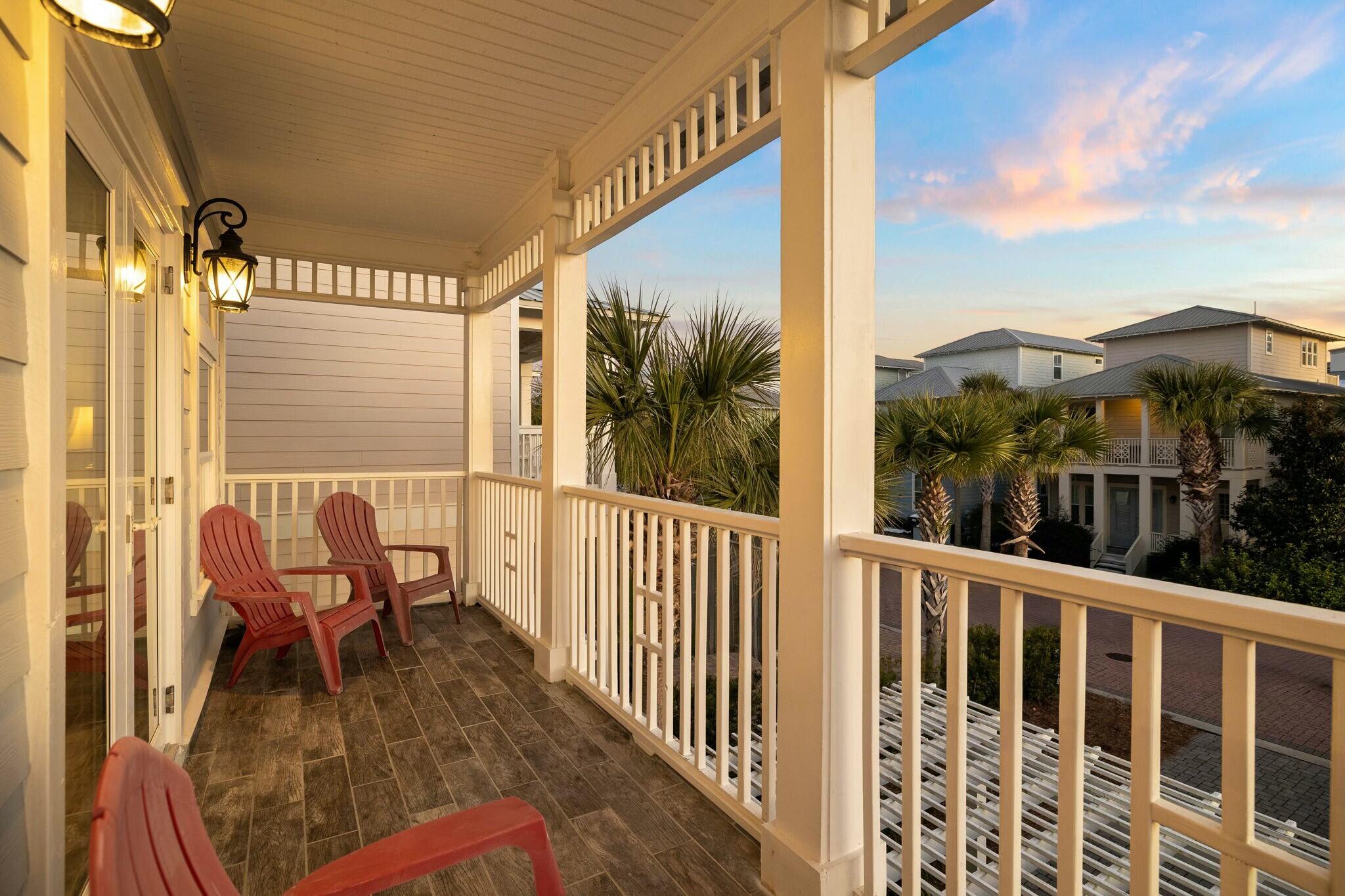 136 Surfer Lane Inlet Beach, FL 32461 - Photo 6 of 50 a view of a chair and table in the balcony