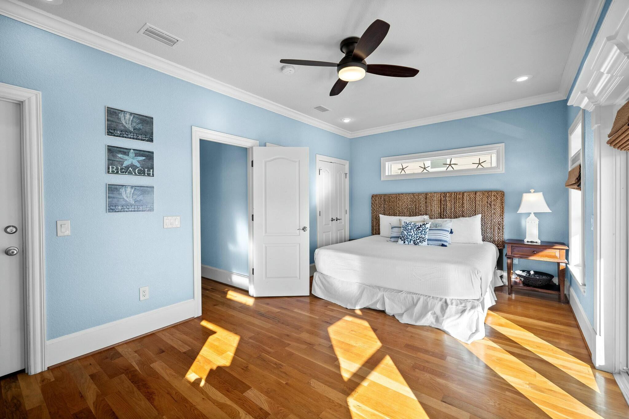 136 Surfer Lane Inlet Beach, FL 32461 - Photo 8 of 50 a bedroom with a bed and a ceiling fan