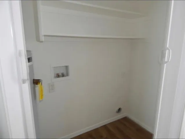 a view of small space with racks on the wall