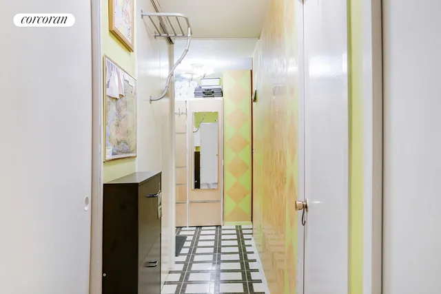 a bed room with a bed and a chair