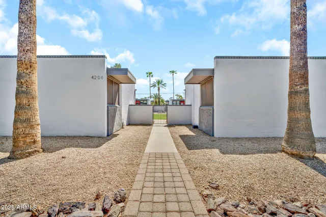a view of a backyard of a house