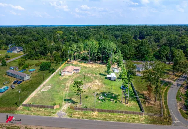 a view of a yard with an outdoor space