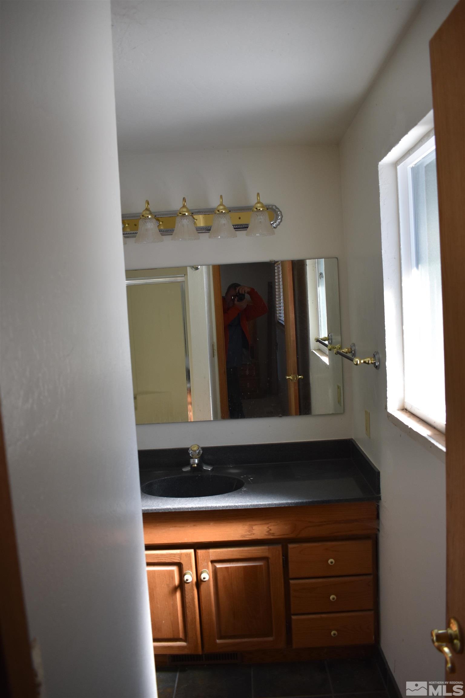 229 Sunflower Circle Stateline, NV 89449 - Photo 15 of 27 a close view of sink and mirror