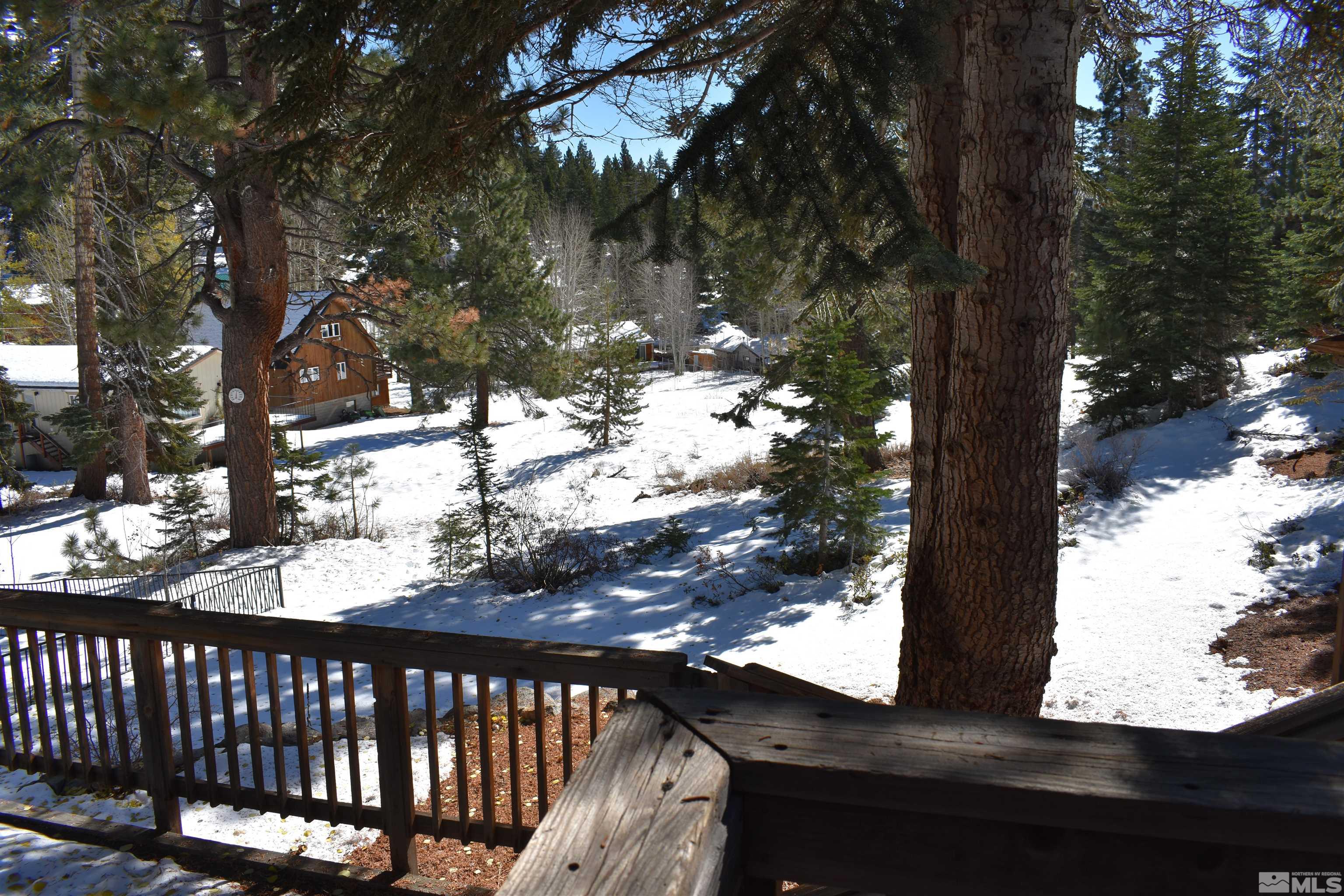 229 Sunflower Circle Stateline, NV 89449 - Photo 21 of 27 a view of balcony with wooden floor and fence