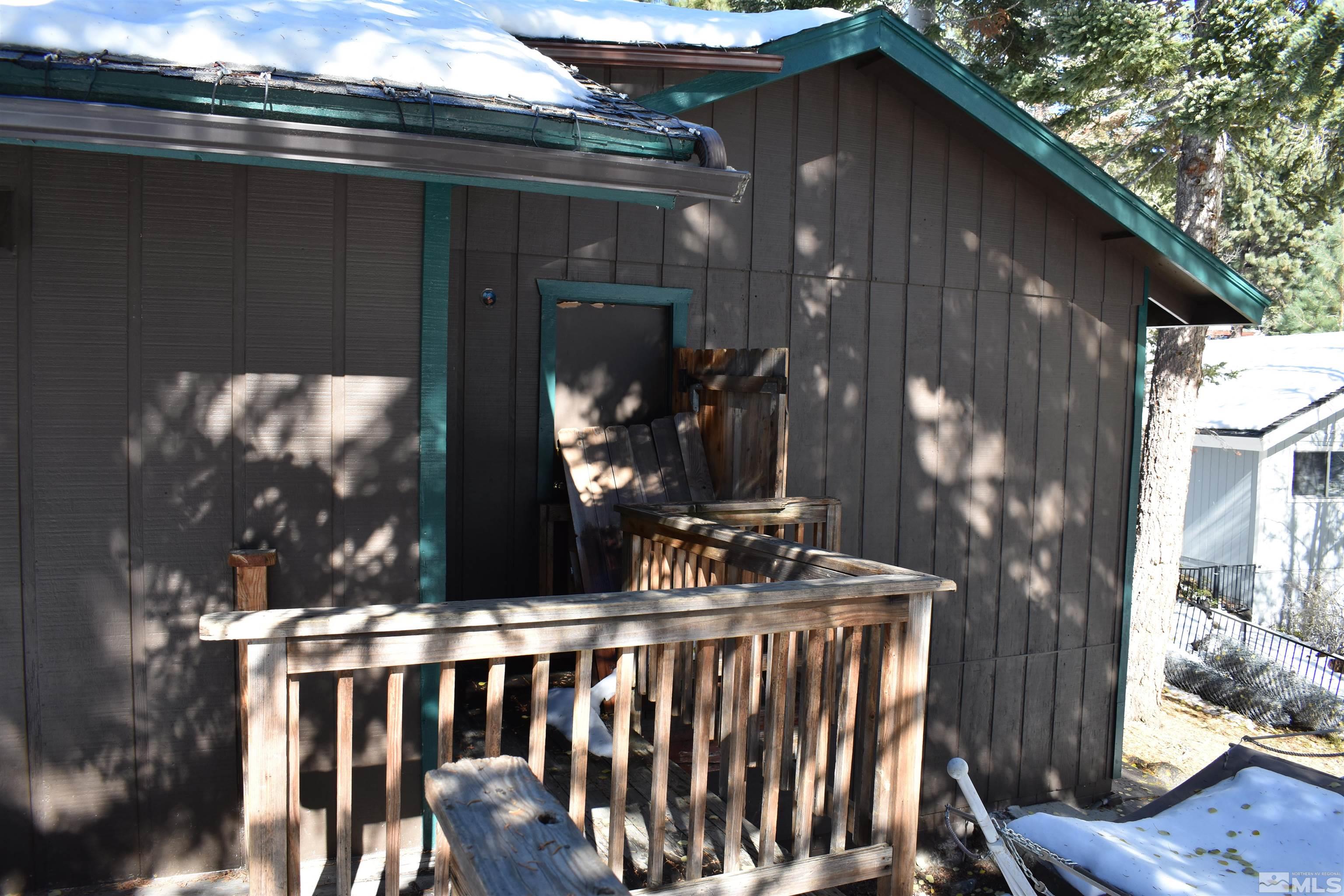 229 Sunflower Circle Stateline, NV 89449 - Photo 24 of 27 a view of backyard with deck and outdoor seating