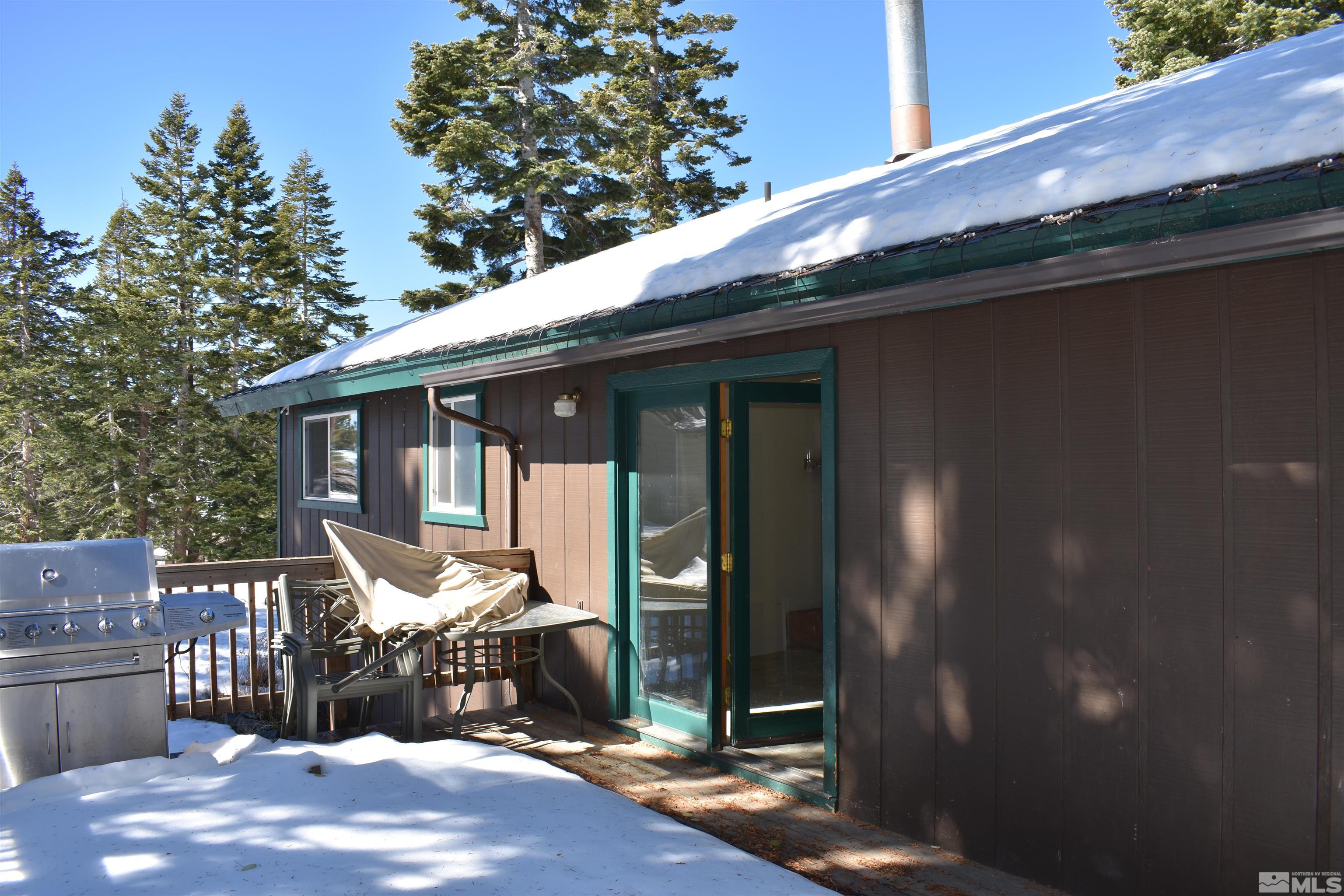229 Sunflower Circle Stateline, NV 89449 - Photo 25 of 27 a front view of a house with outdoor seating