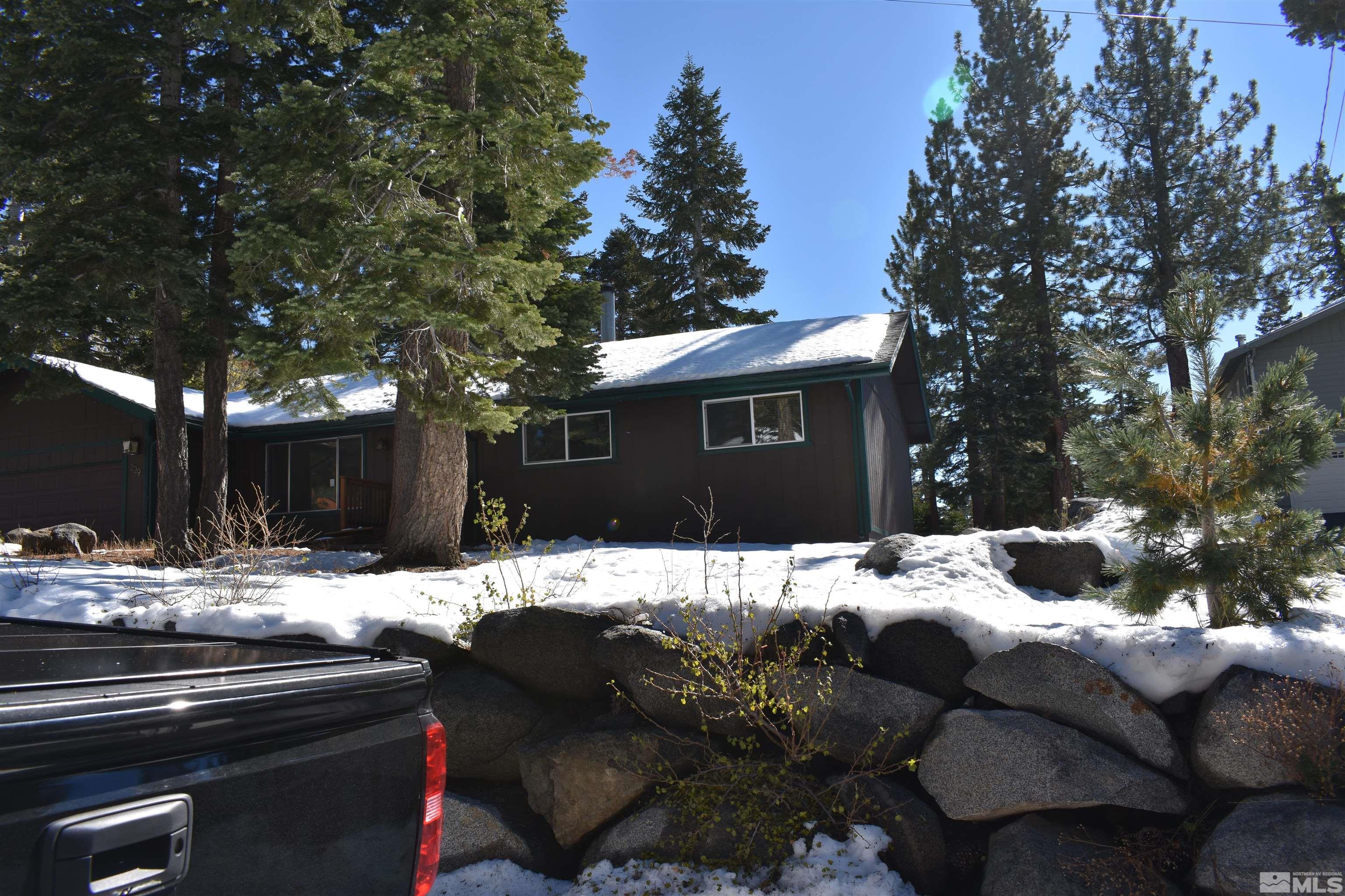 229 Sunflower Circle Stateline, NV 89449 - Photo 3 of 27 a outdoor space with patio furniture and a tree