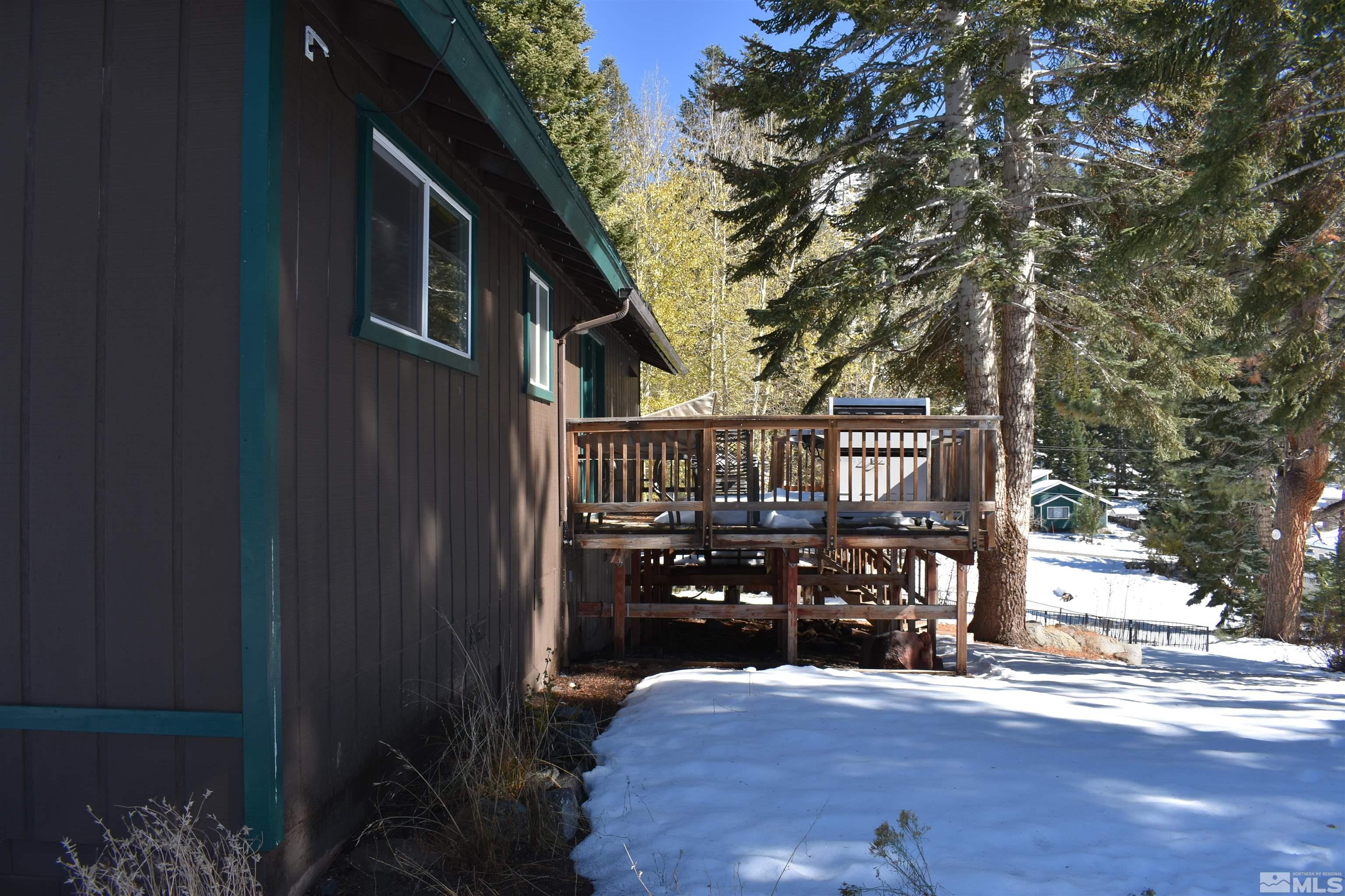 229 Sunflower Circle Stateline, NV 89449 - Photo 6 of 27 a view of a house with wooden deck