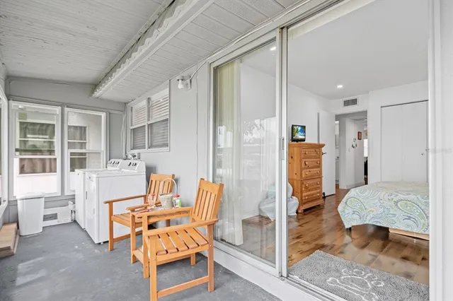 a living room with furniture and a table