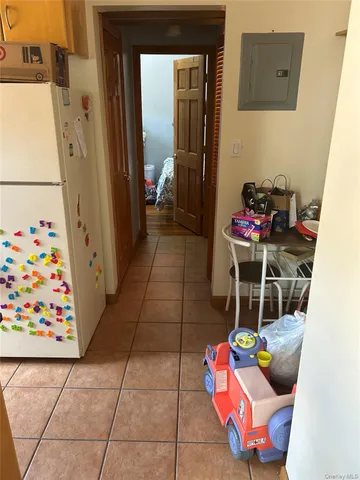 a living room with baby toys