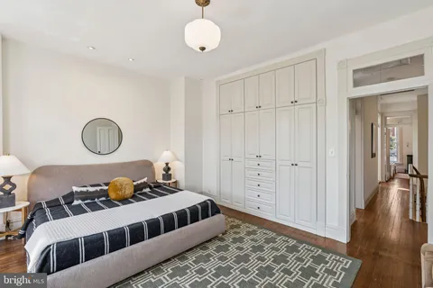 a bathroom with a sink a bathtub and a mirror