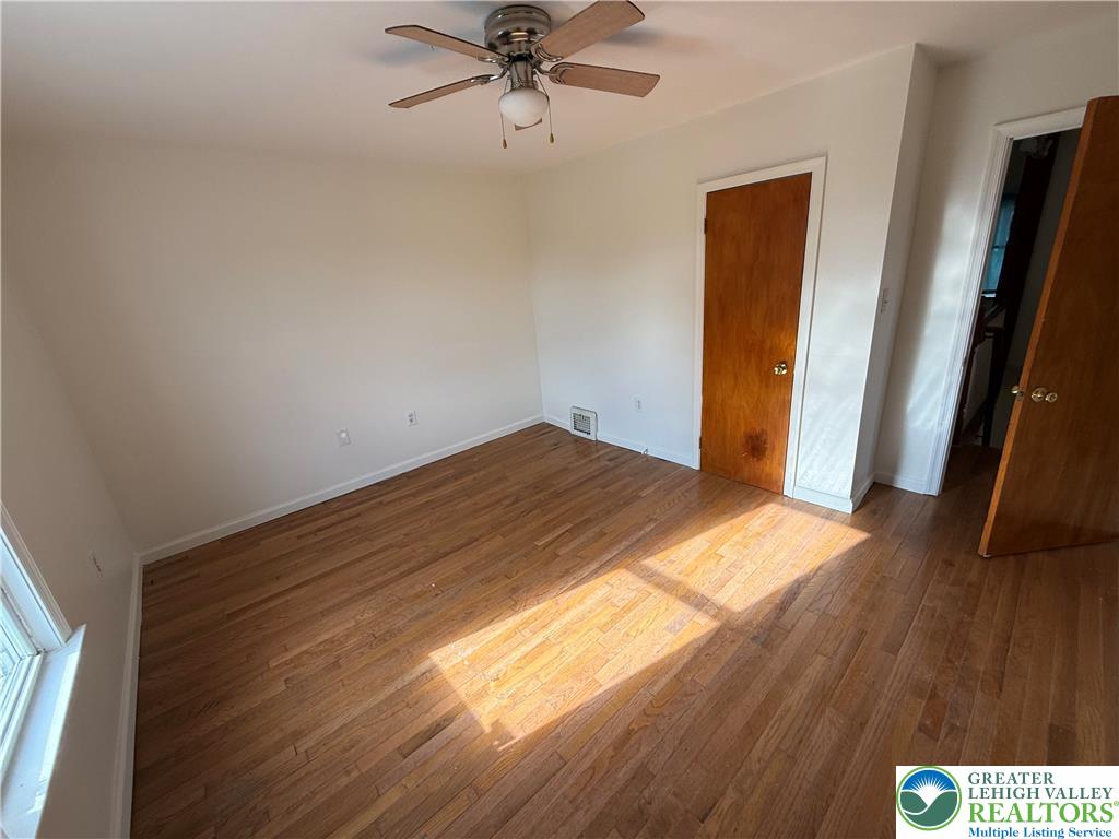 2955 Middletown Road Bethlehem, PA 18020 - Photo 14 of 20 Warm hardwood flooring and ample wall space create a versatile canvas for personalization.