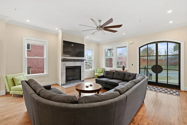 a picture of a bench in front of a wall